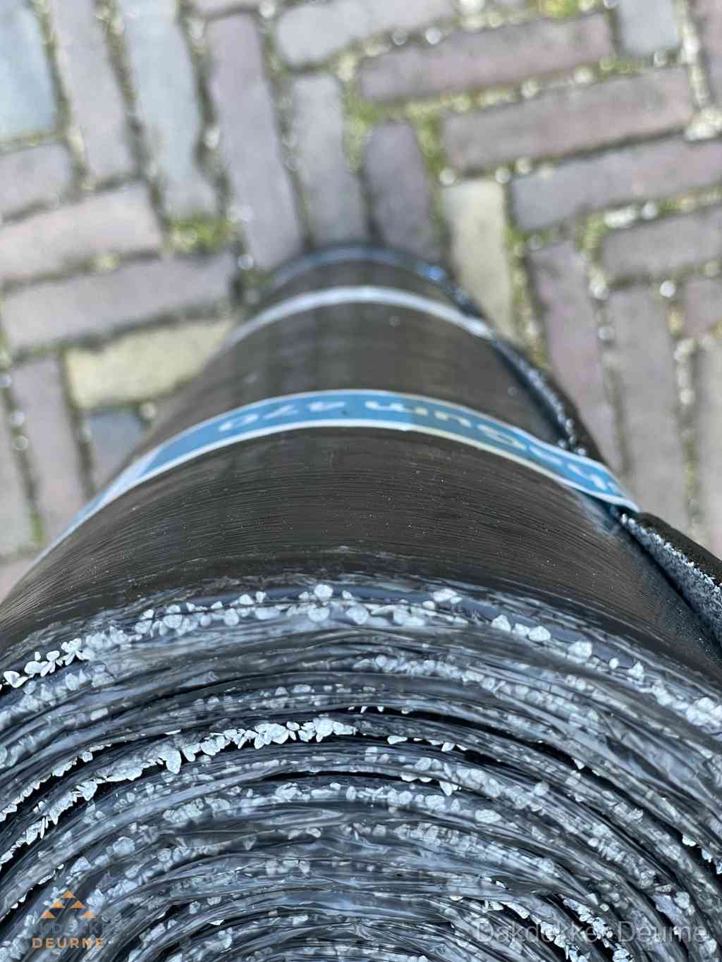 Rol bitumen dakleer met leislag voor plat dak in Deurne